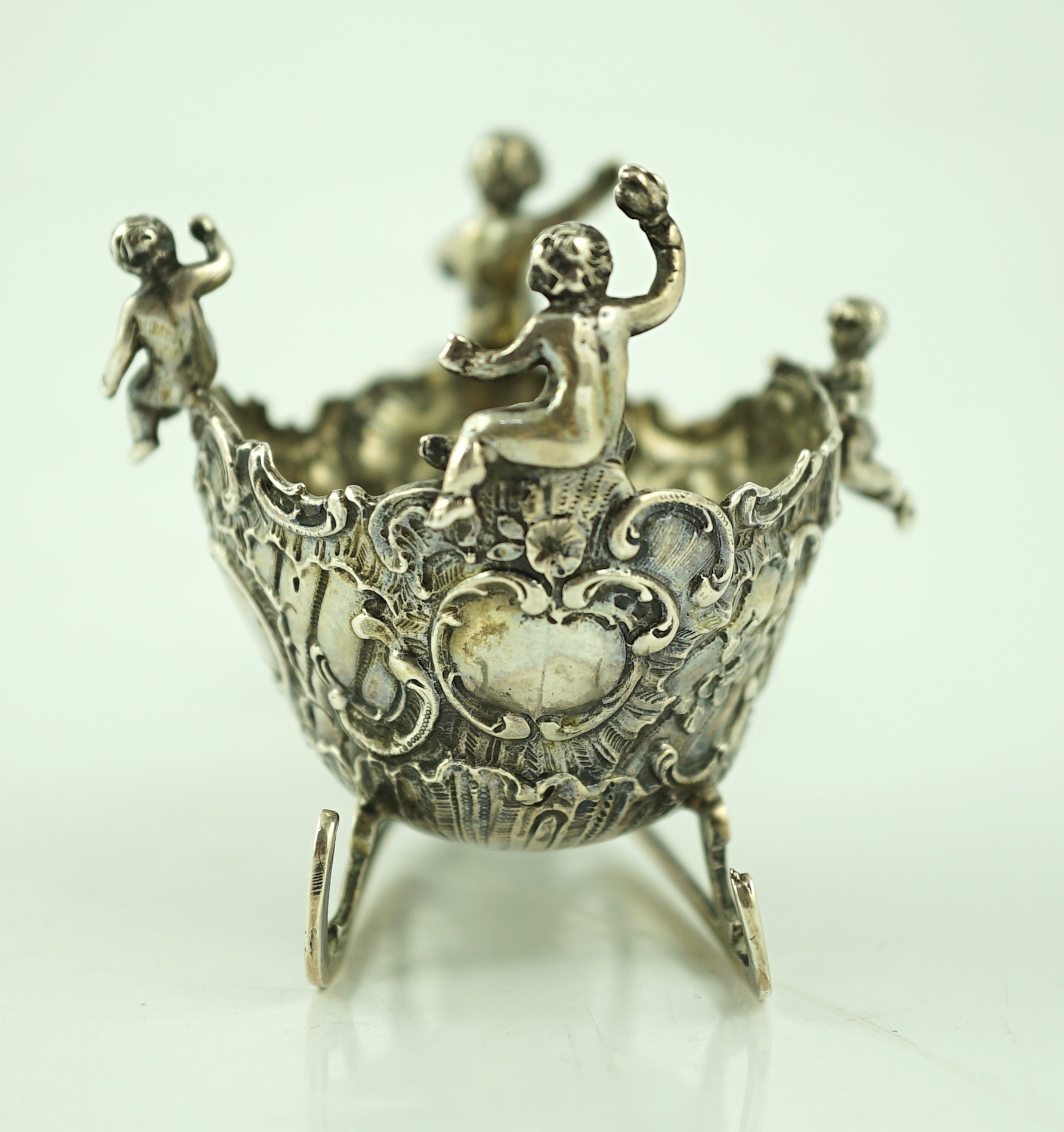 A late 19th century miniature silver model of a sleigh with putti, pulled by a goat, import marks for John George Smith